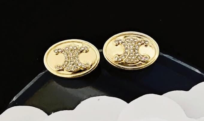 C gold earing