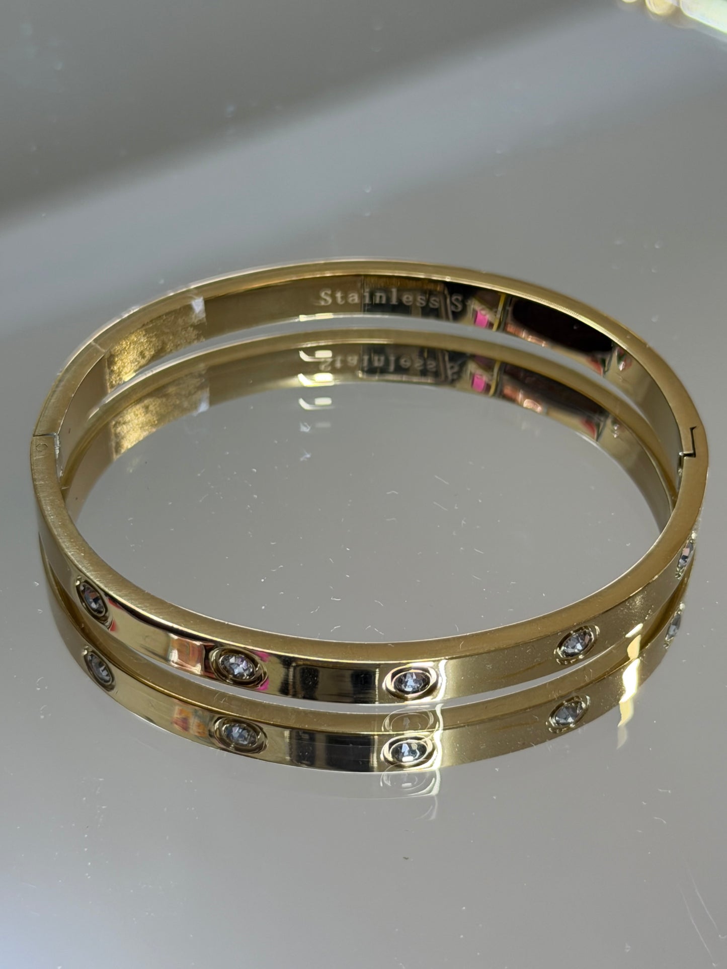 C gold pulsera